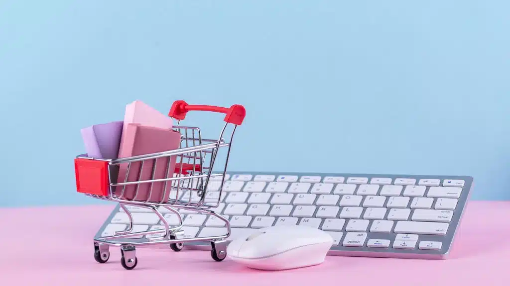 Shopping cart on a keyboard - Launching an E-commerce Business